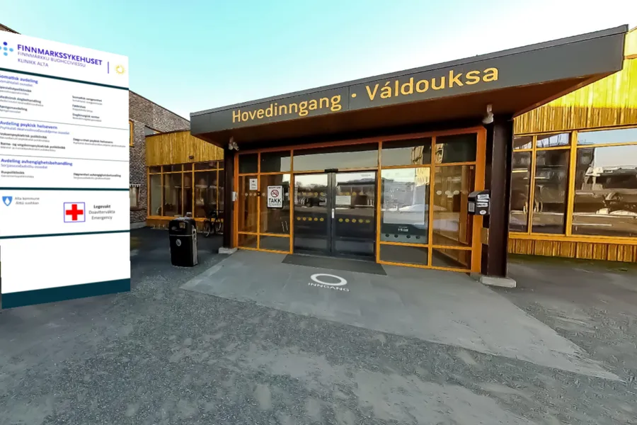 En bygning med et skilt foran